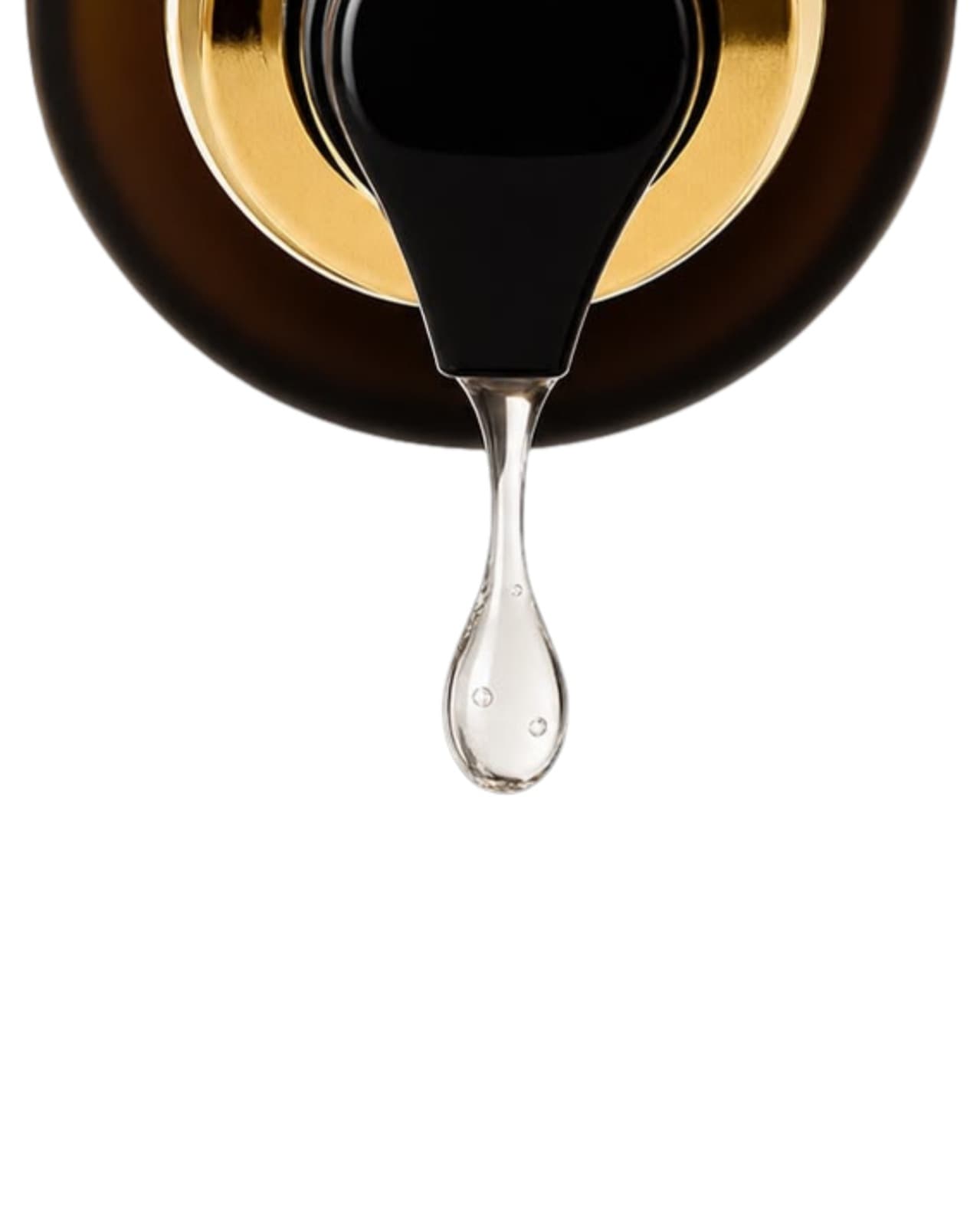 A clear drop of hair serum dispensing from a black and gold pump